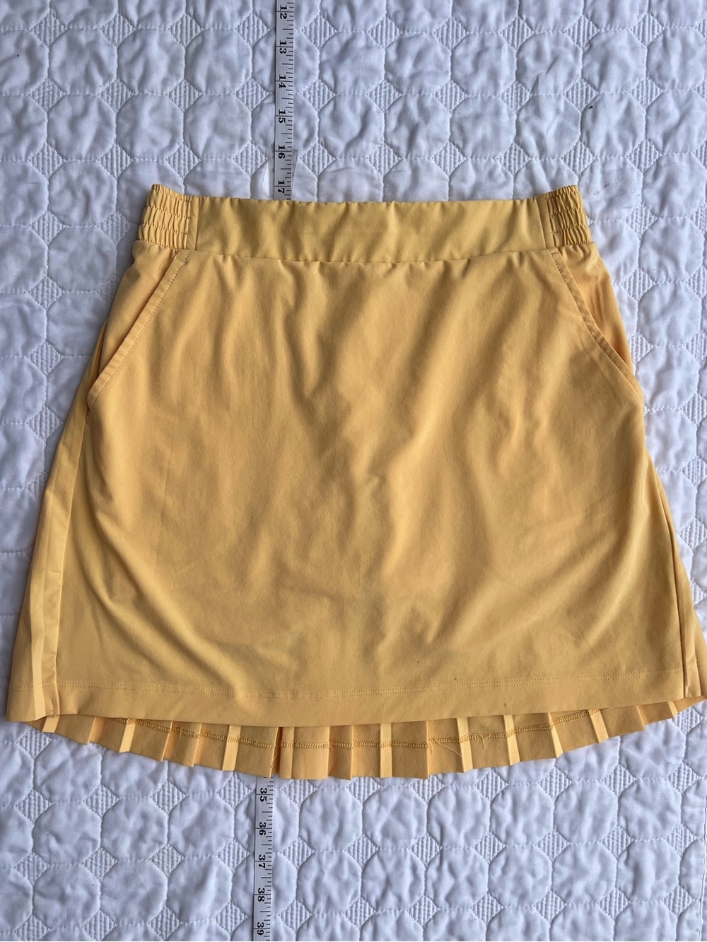CALIA ACE PLEATED BACK GOLF SKORT 16” -
ORANGE YELLOW - Womens XS